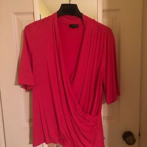 Bright pink wrap shirt.